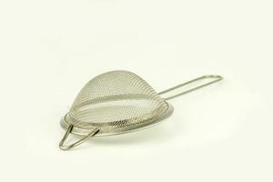 handle sieve on white background photo