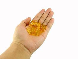 man handle fish oil photo