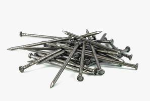 pile of steel nail on white background photo