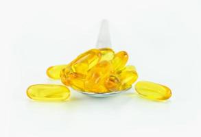 fish oil place on spoon photo