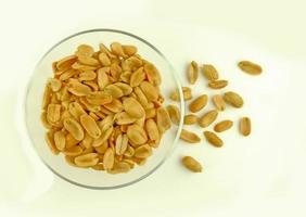 roasted peanut on glass bowl photo