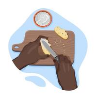 Hands of black person spread cream cheese on crispy slice of bread with knife on a wooden cutting board with crumbs from personal point of view. Process of cooking. Vector flat isolated concept