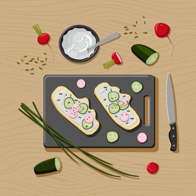 Flat lay healthy vegetarian sandwich with ingredients on wooden background. Cutting board, kitchen knife, slices of cucumber and radish, scalion and bread with cream cheese. Top view concept.