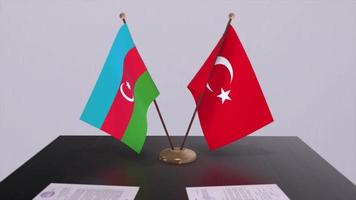 Azerbaijan and Turkey flags at politics meeting. Business deal video