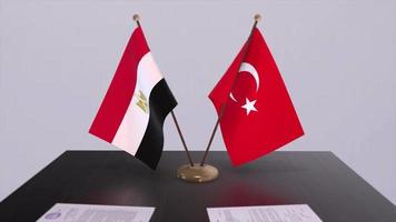 Egypt and Turkey flags at politics meeting. Business deal video