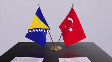 Bosnia and Herzegovina and Turkey flags at politics meeting. Business deal video