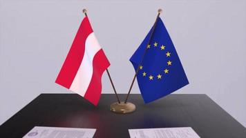 Austria e Unione Europea bandiera su tavolo. politica affare o attività commerciale accordo con nazione 3d animazione video