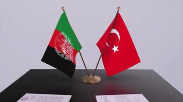 Afghanistan and Turkey flags at politics meeting. Business deal video