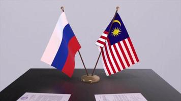 malaysia och ryssland nationell flagga, företag möte eller diplomati handla. politik avtal animering video