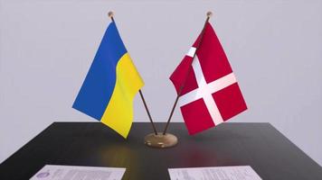 Ukraine and Denmark flags on politics meeting animation video