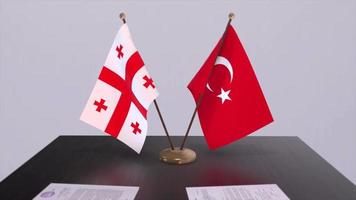 Georgia and Turkey flags at politics meeting. Business deal video