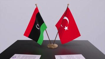 Libya and Turkey flags at politics meeting. Business deal video
