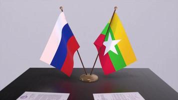 Myanmar e Russia nazionale bandiera, attività commerciale incontro o diplomazia affare. politica accordo animazione video