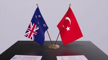 New Zealand and Turkey flags at politics meeting. Business deal video