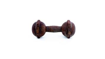 Old rusty dumbbell isolated on white background photo