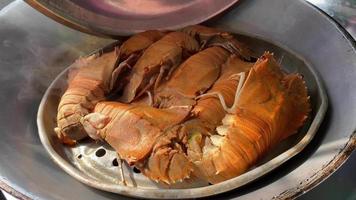 Flathead lobster, thenus orientalis, oriental flathead lobster, theninae, lobster moreton, thenus,  is a very delicious seafood. can be found in fish markets in tropical countries video