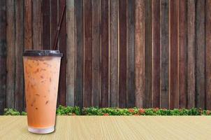 Ice Tea,iced milk tea on wooden background ,Summer drinks with ice photo