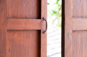 used to open the  window ,Old wooden window. Thailand traditional style photo