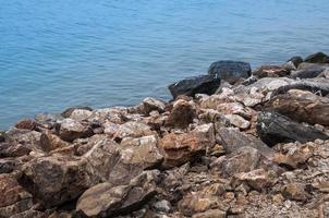 Typical rocky coastline in thailand photo