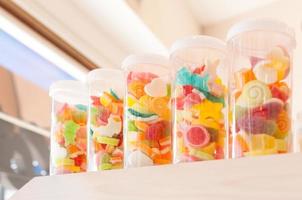 Jelly sweet, flavor fruit, candy dessert colorful on sugar in a jar photo