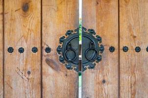 wooden door handle with steel plate at the center of korea style photo