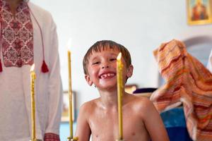 Orthodox baptism of a Belarusian child in a church. photo