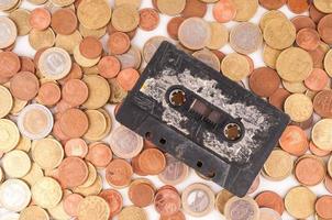 Cassette on coins photo