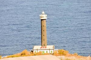 Lighthouse on the coast photo