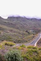 Road through the scenic landscape photo