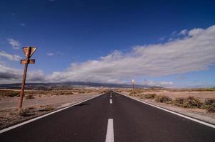 Road through the scenic landscape photo