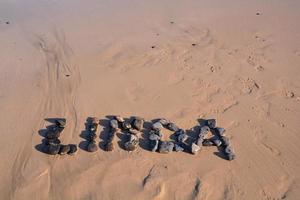 Rocks in the sand photo