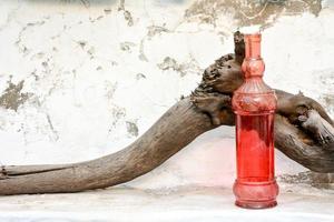 Red glass bottle photo