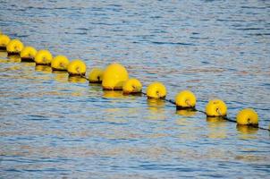 Yellow floating buoys photo