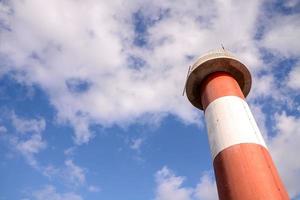 Red and white lighthouse photo