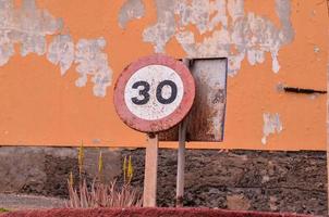 Old speed limit sign photo