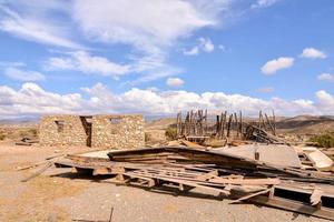 Abandoned building in the desert photo