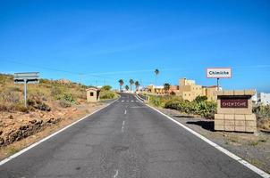 Road through the scenic landscape photo