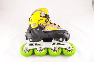 Yellow and green rollerblade photo