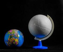 Globes on dark background photo