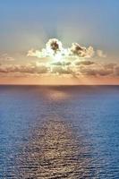 Sunset over the sea photo