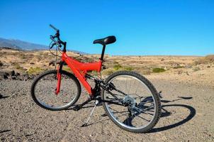 Bicycle in the desert photo