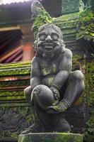 Traditional balinese deity statue. Ubud photo