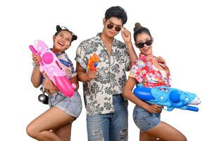 Teenager group have fun with water gun on Songkran Day photo