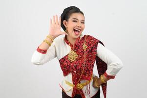 Portrait of Beautiful Thai Woman in Traditional Clothing standing Posing photo