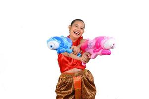 Portrait beautiful woman in Songkran festival with water gun photo