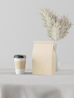 Blank brown paper bag and coffee cup photo