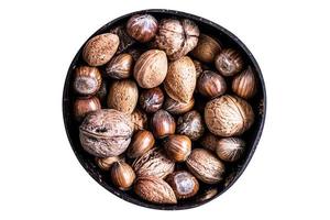 925 Black bowl with nuts isolated on a transparent background photo