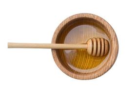 2261 Bowl with honey isolated on a transparent background photo