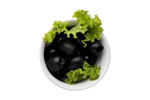 3324 White bowl with black olives isolated on a transparent background photo