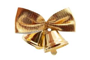 6781 Gold bells and ribbon isolated on a transparent background photo